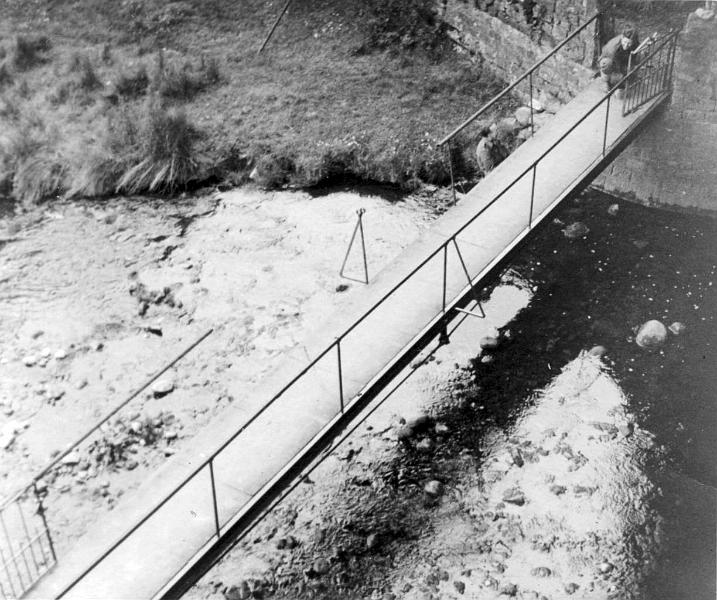 Iron Bridge 1948.JPG - The old Iron Bridge, which crossed the Beck, from under the Railway Bridge to the site of the Gas Works. The bridge is being repaired - Robert Slater is on top of the bridge with ???? underneath  Photograph taken by Brian Bradley, RAF photographer, in 1948.